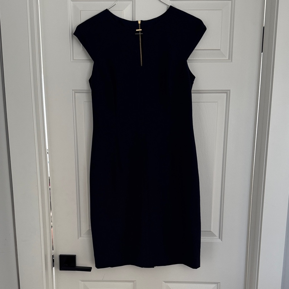 Tahari Navy Sheath Dress with Gold Zip Detail down back. Fully lined. Size 6
